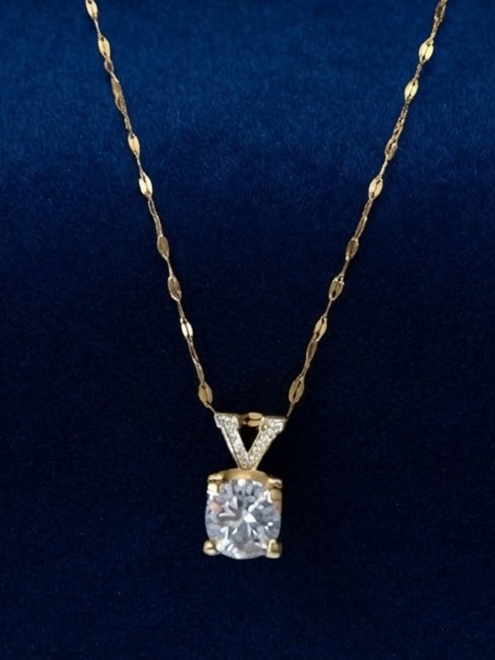 Gold Tone Necklace with Clear Stone Pendant & V with Rhinestone Accent